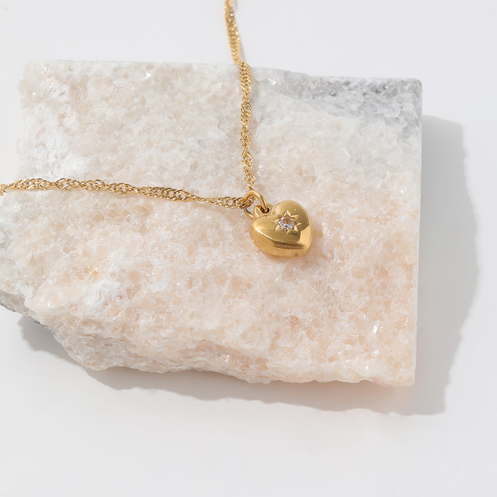 Le Grá Bundle - Heart Pendant Necklace: A dainty gold necklace featuring a heart-shaped pendant, radiating love and sophistication