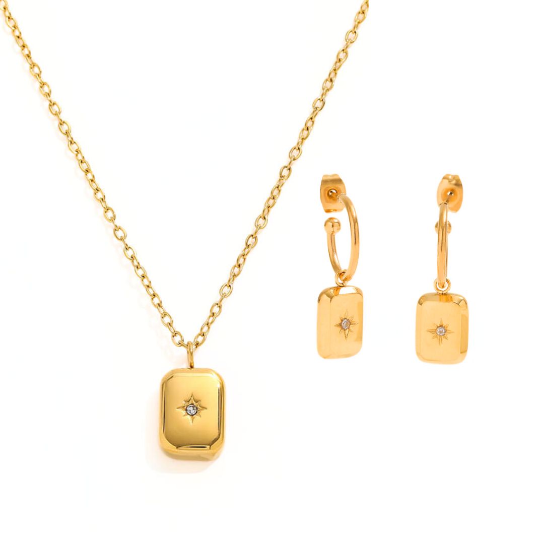 the poise necklace is a minimal piece of jewellery. The necklace has a dainty chain and the pendant is a rectangle shaped charm that has a star embellished at it's centre. The poise necklace also has matching earrings, as seen here. The necklace and earrings can be purchased individually or as a set. 