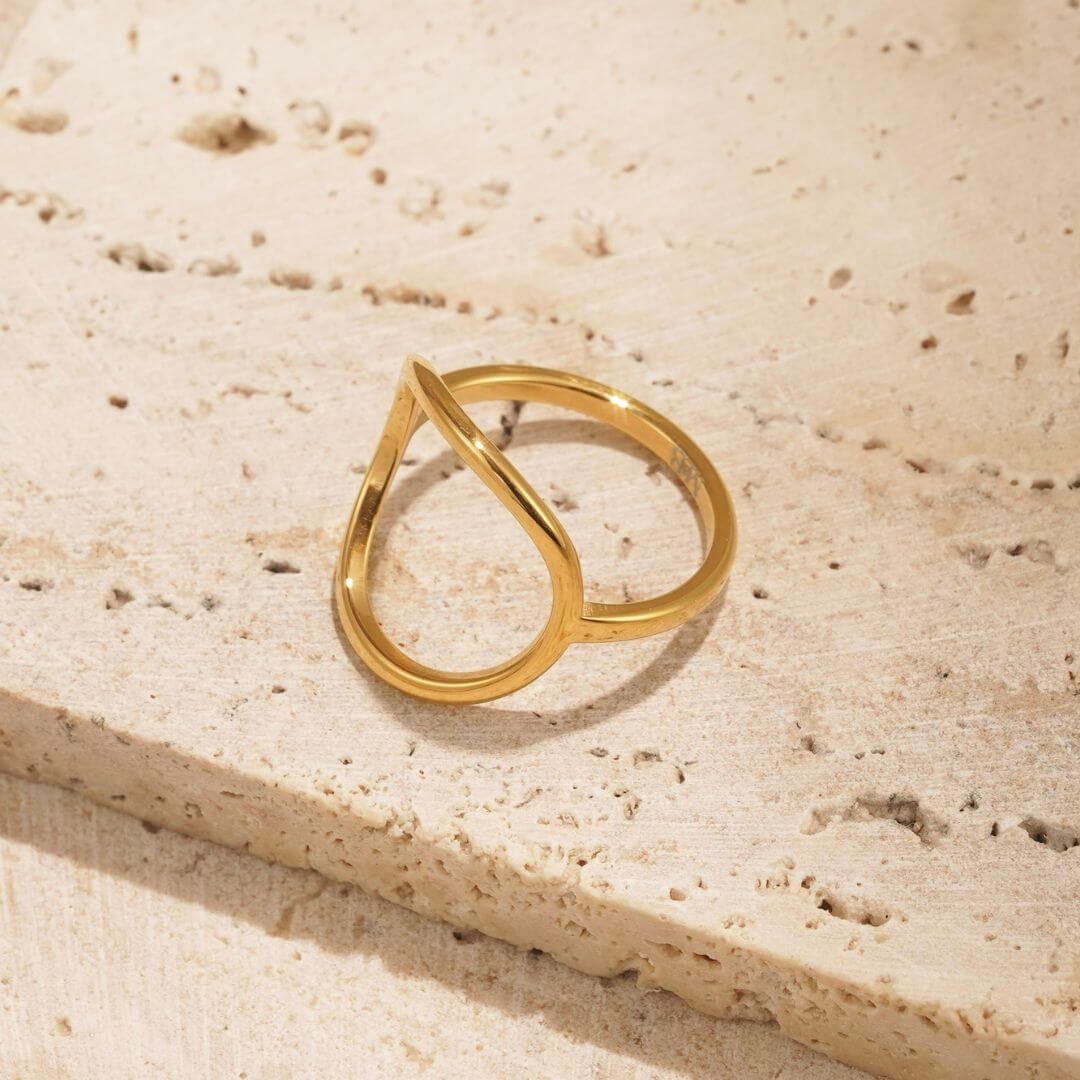 circle shaped ring called the cosmic ring. it's a water resistant ring that can be styled up or down. 