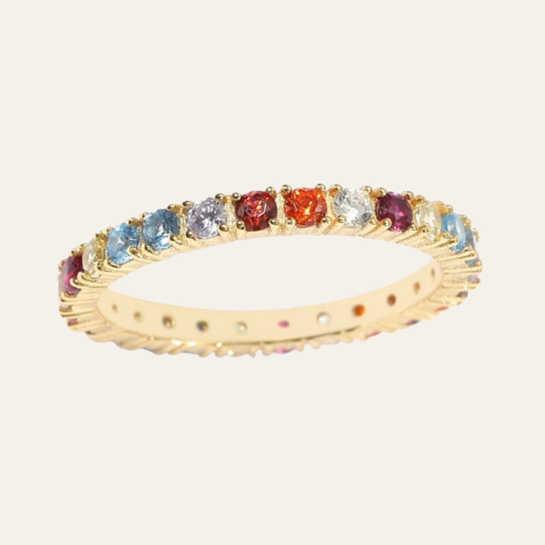COLOURFUL RING WITH ZIRCONIA STONES EMBEDDED IN THE BAND. Jewellery from an irish business.