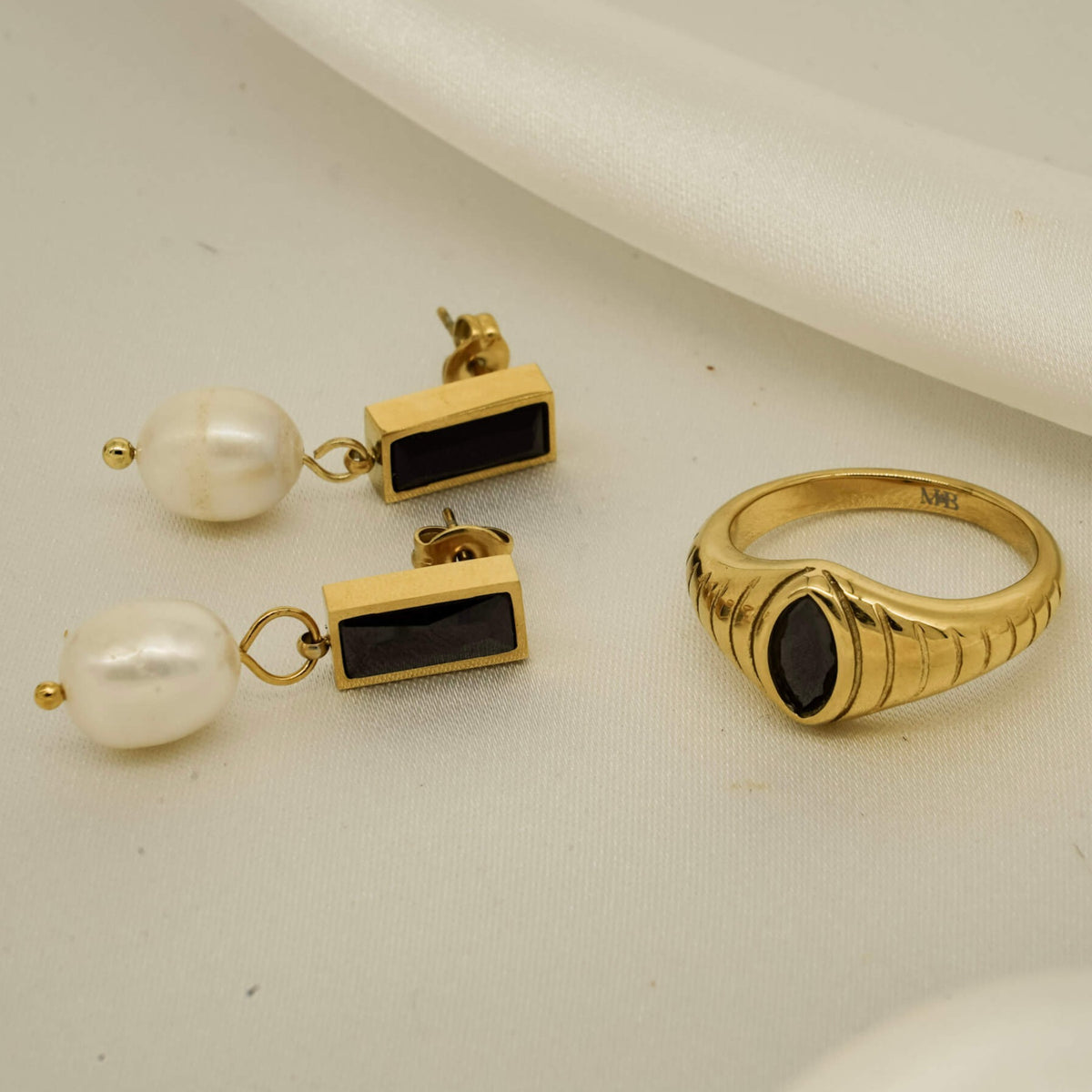 onyx pearl earrings and onyx ring. 