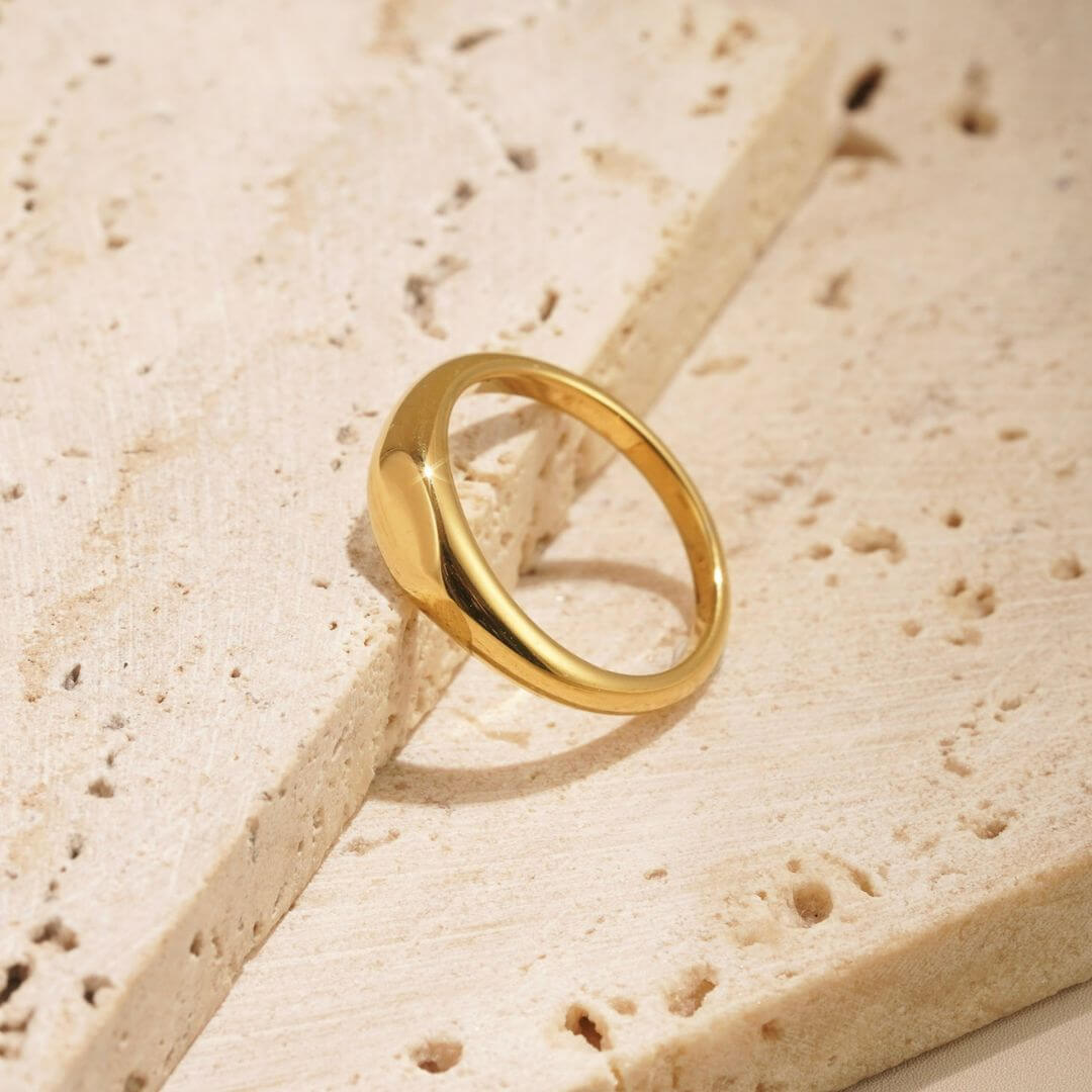 simple gold signet ring called the relic ring. perfect for engraving.